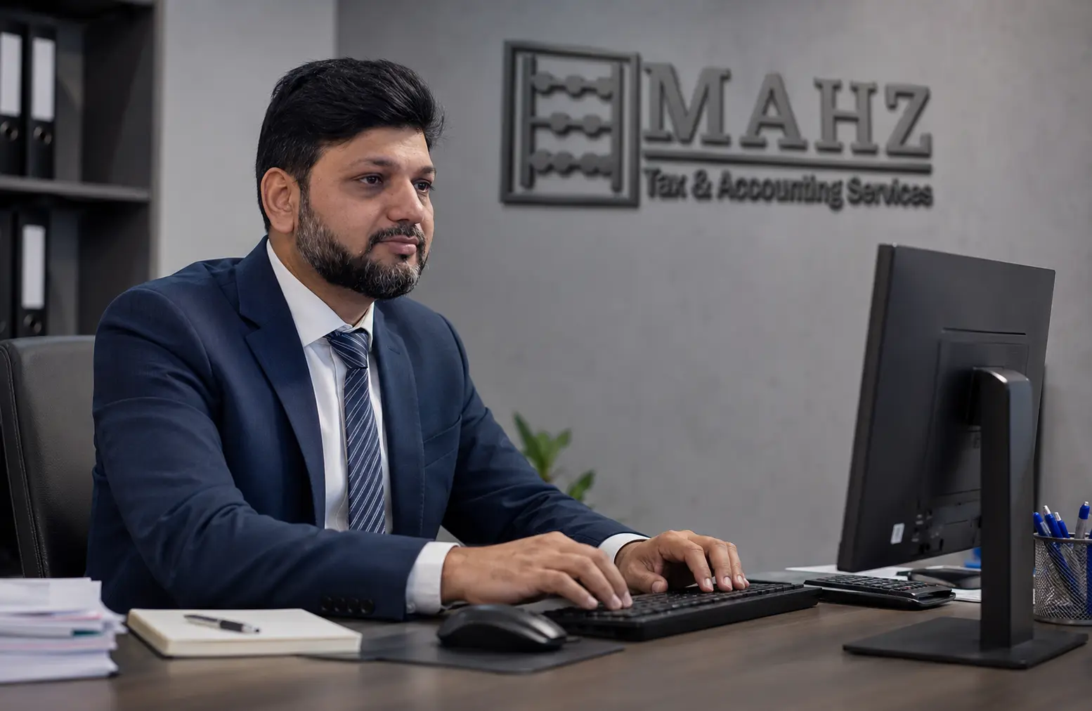 Mohammed H. Karimi at MAHZ Tax office
